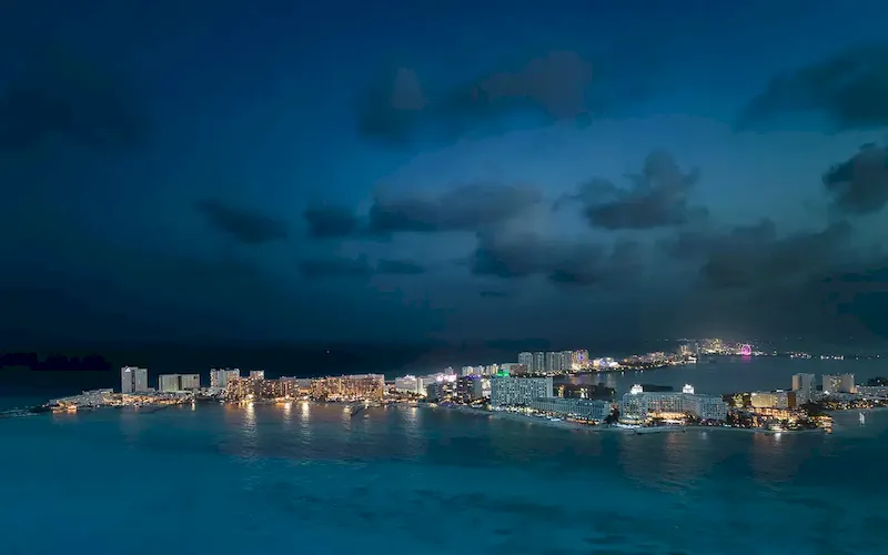 Cancun and Isla Mujeres coastline after dark