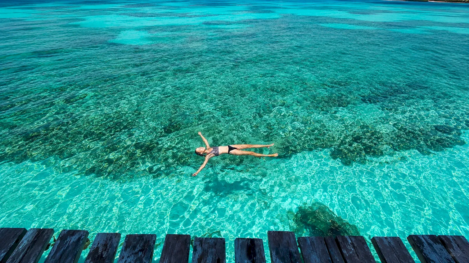 Snorkeler above a shallow Caribbean reef